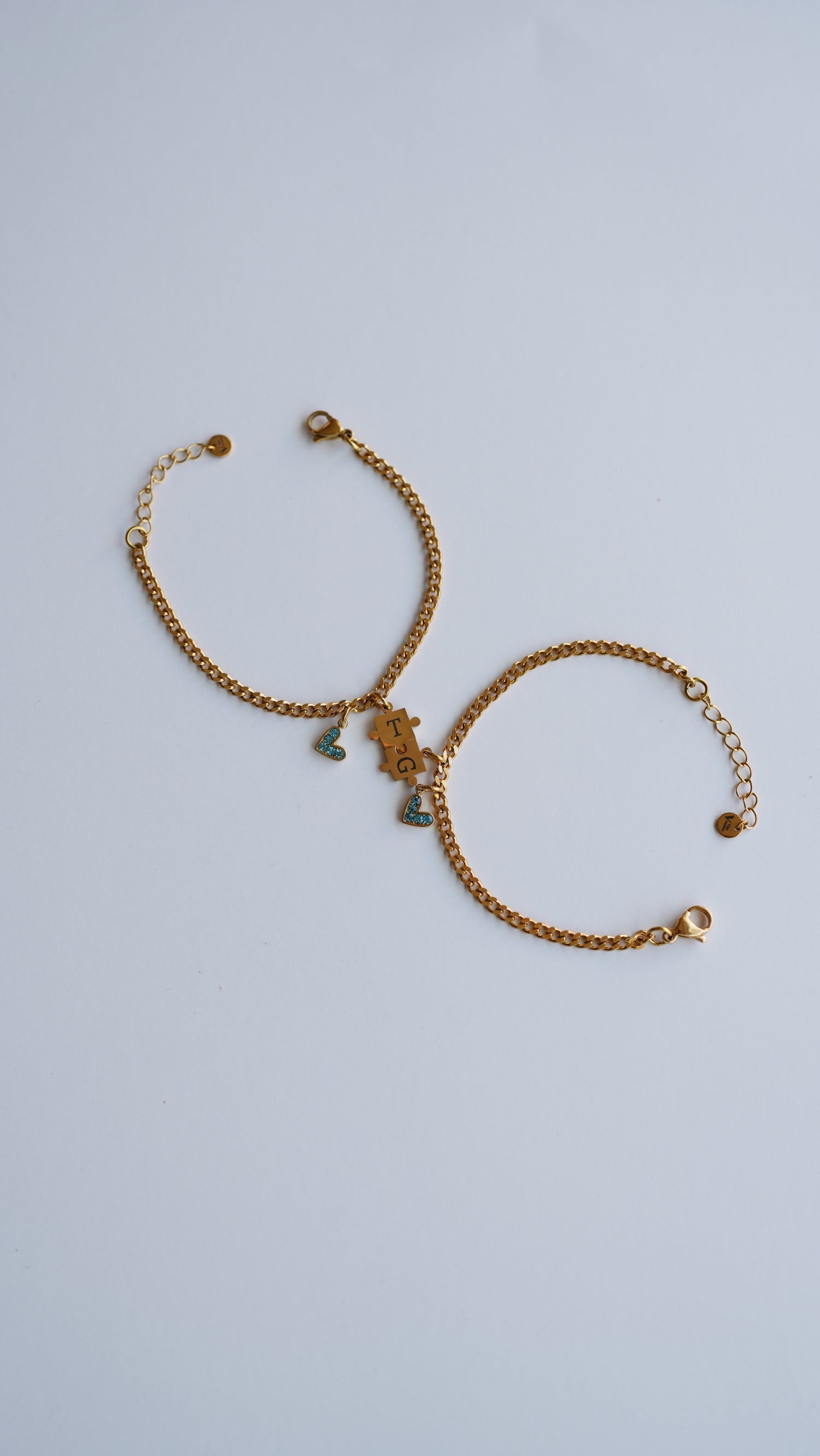 JUEGO DE DOS PULSERAS PUZZLE